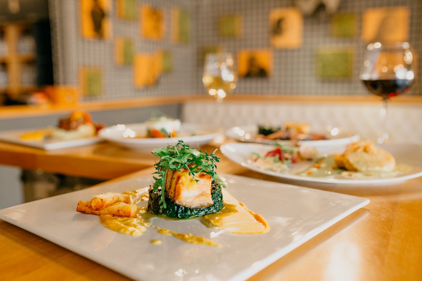 Plated catering dishes on white plates