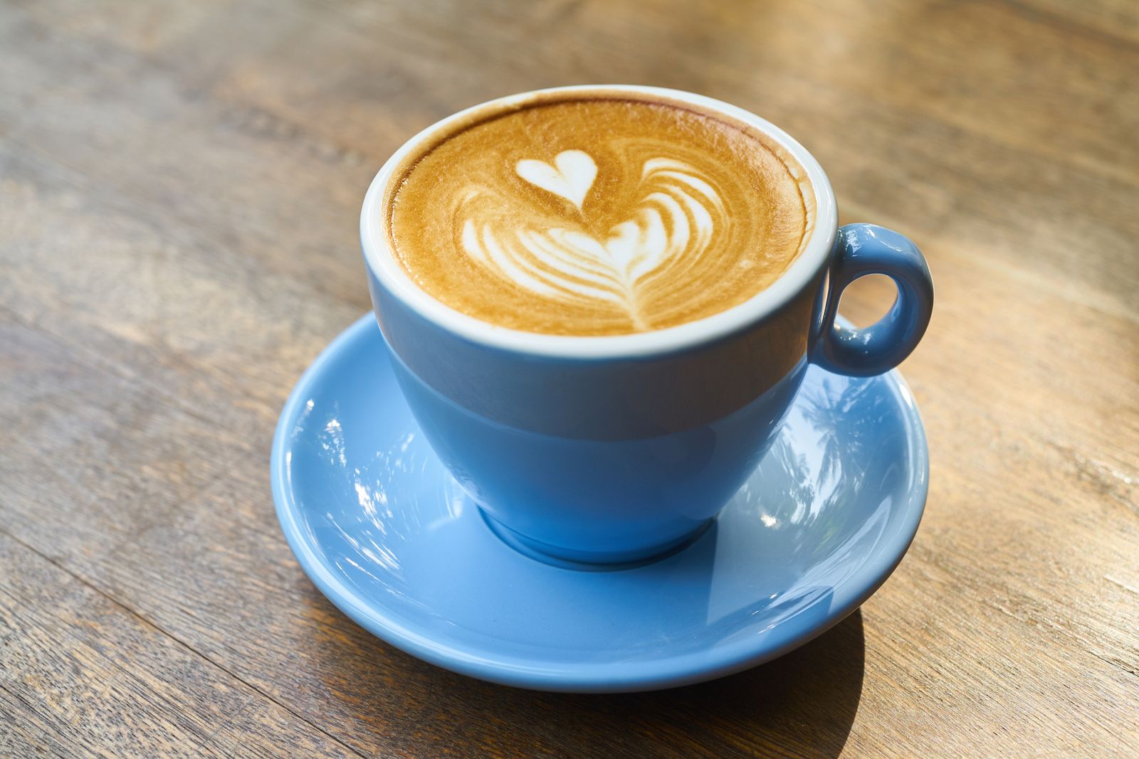 A beautifully crafted latte with heart-shaped art