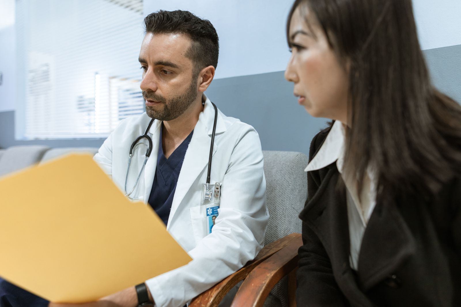 A doctor discussing health records with a patient