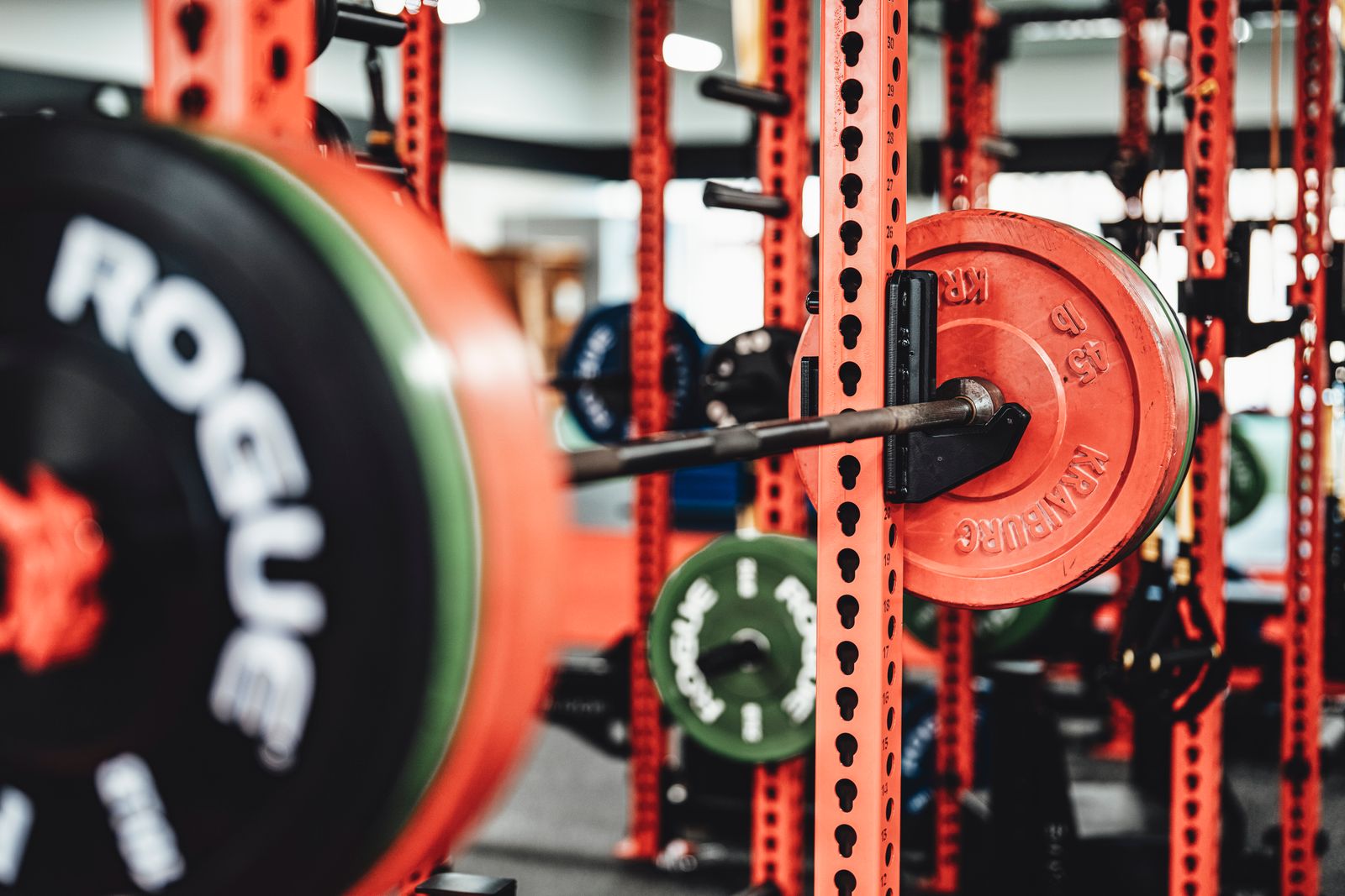 A weightlifting setup with a barbell and rack