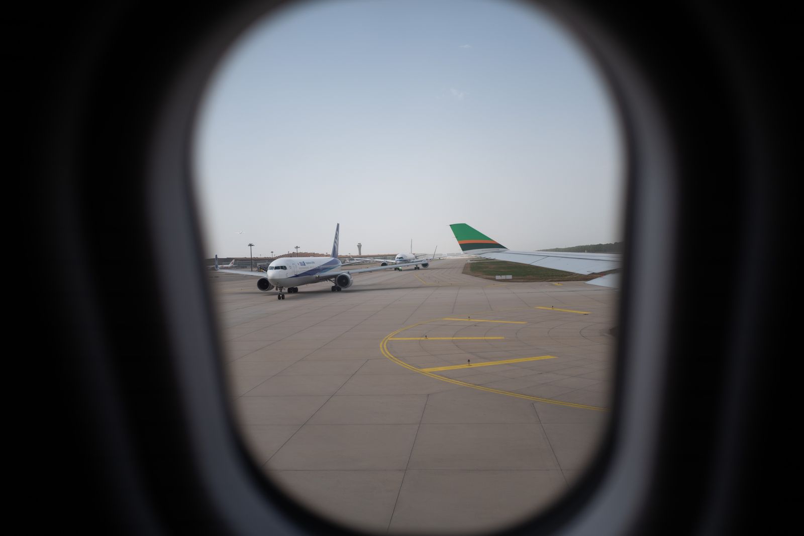 An airplane parked at an international airport