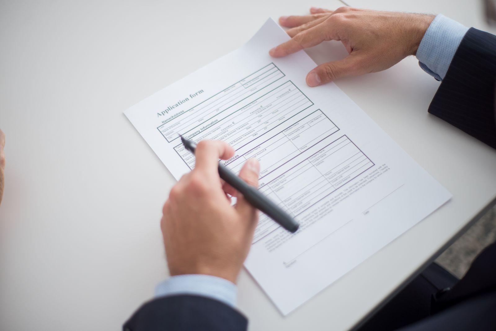 A professional reviewing immigration paperwork