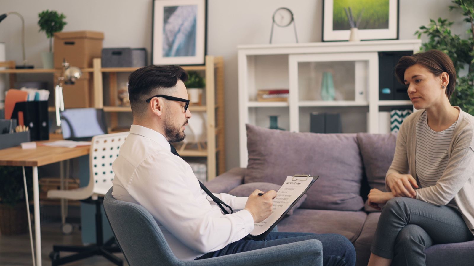 A therapist in a consultation session with a patient
