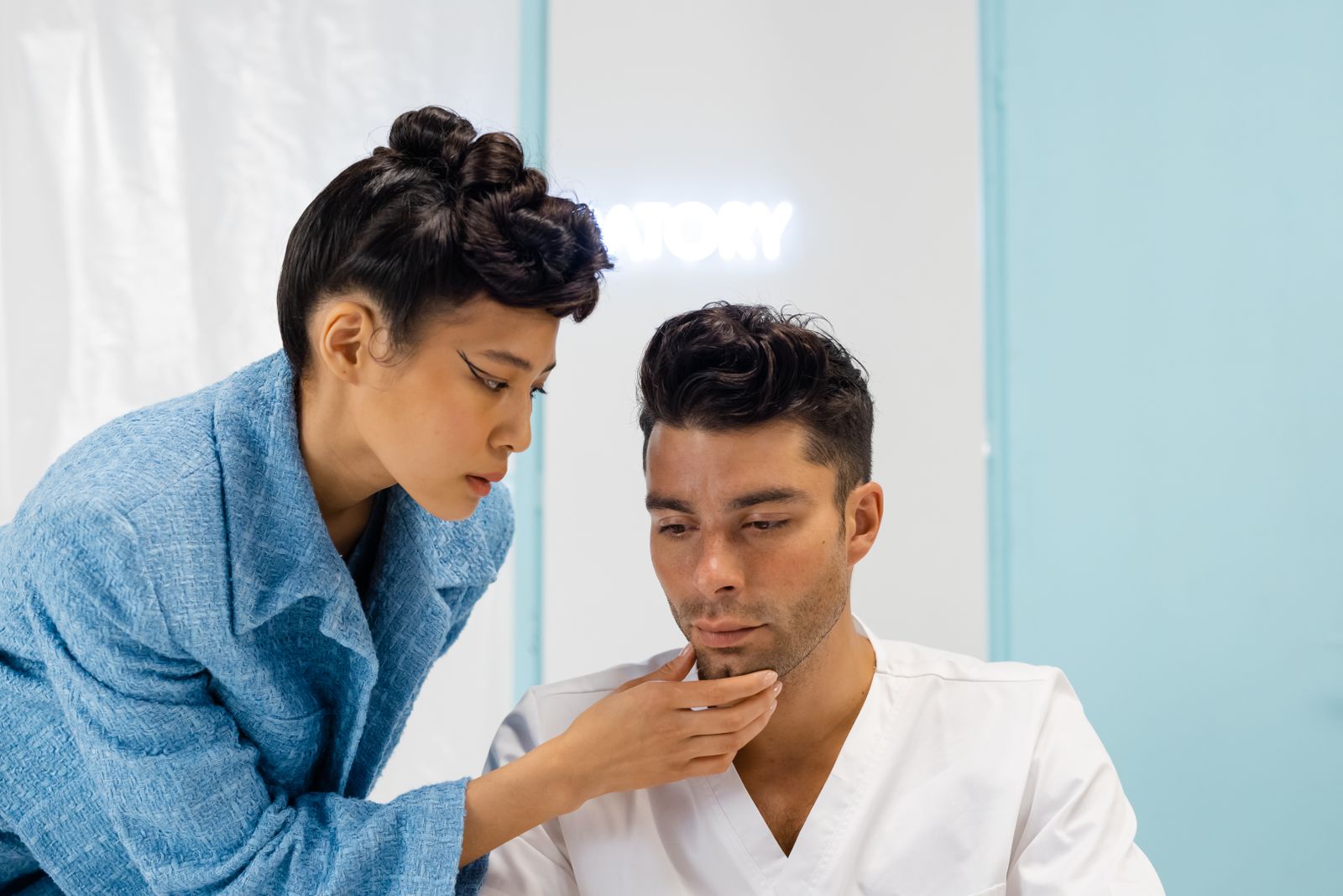 A medical professional examining a patient