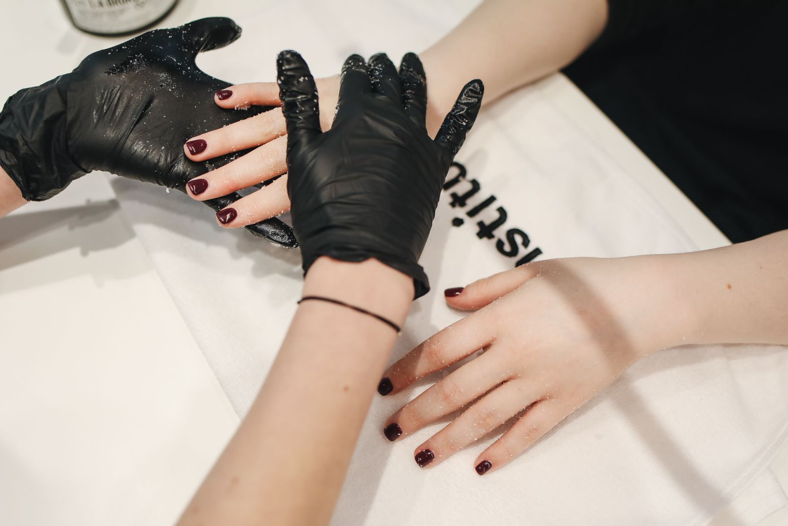 A close-up manicure session at a nail salon