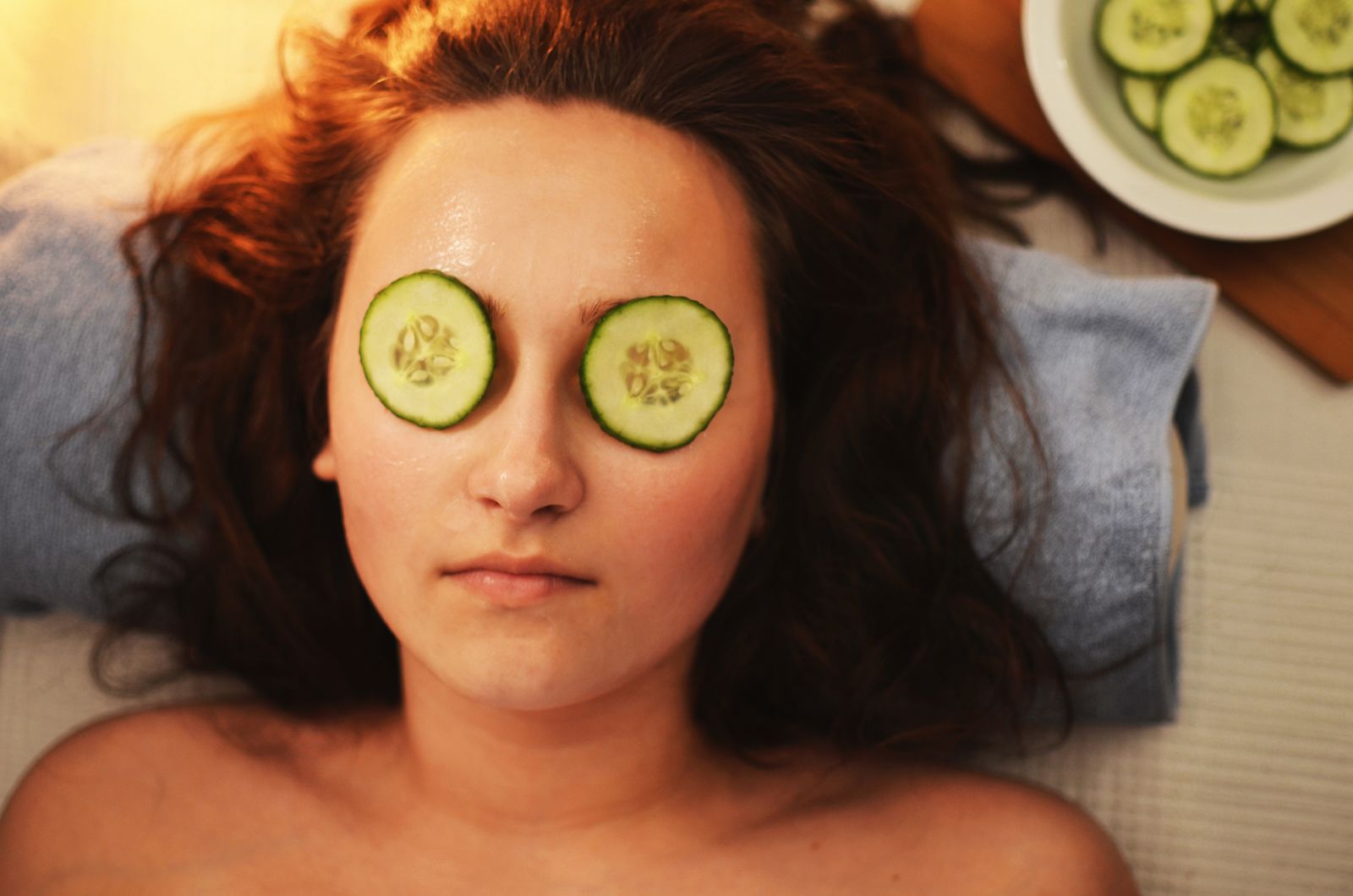 A woman enjoying a relaxing facial treatment