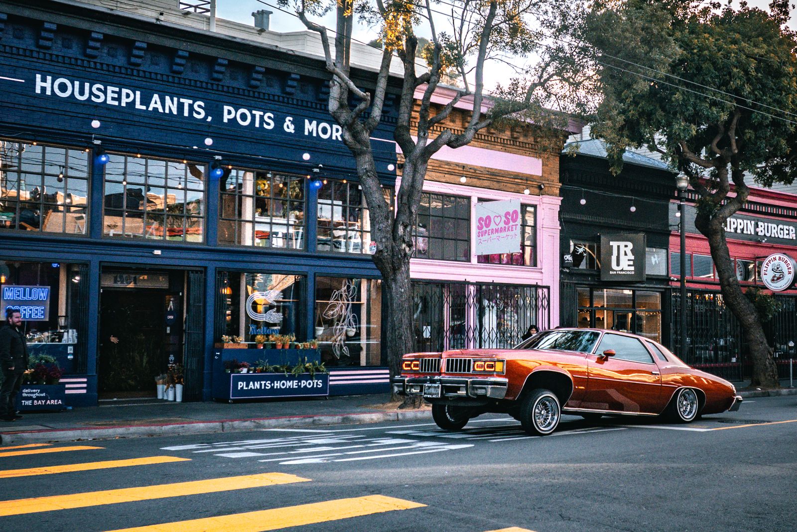 Classic car parked in front of North Beach shops